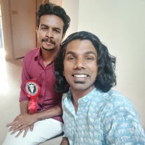 Adhil Noushad with singer Athul Narukara, famous for the song Paala Palli Thirupalli from Kaduva movie, best graphic designer in Kerala