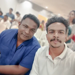 Adhil Noushad with Malayalam music director Rahul Raj, best graphic designer in Kerala