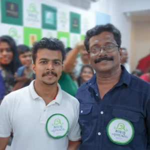 Adhil Noushad with Malayalam actor Appunni Sasi, portfolio of best graphic designer in Kerala