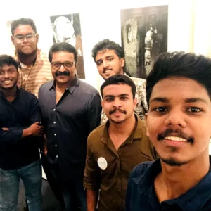 Adhil Noushad with Malayalam director ranjipanikar during an event, best graphic designer in Kerala