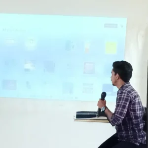 Adhil Noushad conducting a graphic design workshop at MES Asmabi College Vemballur, best graphic designer in Kerala
